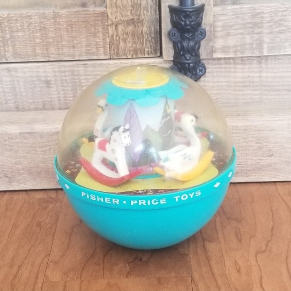 Vintage Fisher-Price Rolly Poly Spinning Chime Toy Ball